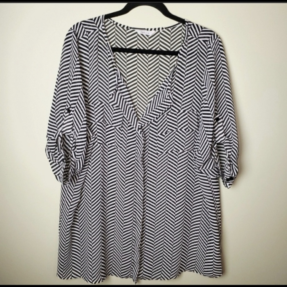 Reitman’s Black and White Top